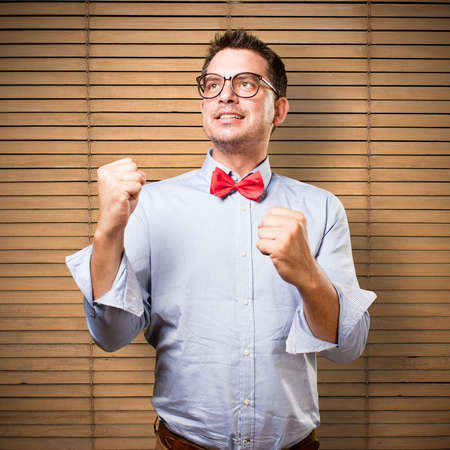 Man wearing a red bow tie. Looking succesful.の写真素材