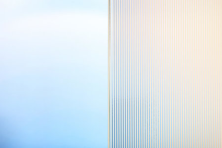 Blue product backdrop with patterned glassの写真素材