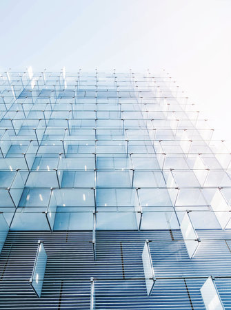 Glass panels in the modern facade of a building in Madrid.