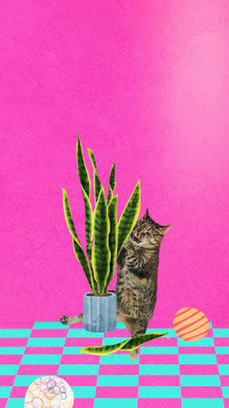 Cat ruining houseplant, funny pet backgroundの写真素材