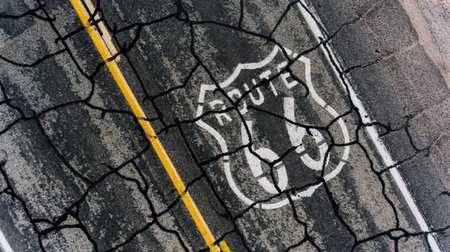 Bicycle lane sign painted on asphalt road in Bangkok, Thailand.