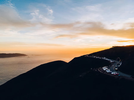 Aerial view of the road on the top of the mountain at sunset