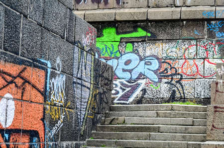 Beautiful street art graffiti. Abstract creative drawing fashion colors on the walls of the city....