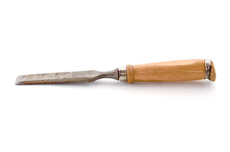 old rusty chisel isolated on a white background