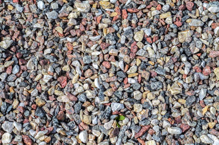 background of small crushed stone close up.の写真素材