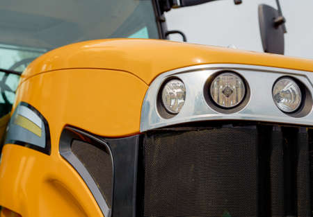 New yellow agricultural tractor. Orange powerful construction machineの写真素材