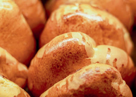 Sweet buns. Freshly baked buns on a dark backgroundの写真素材