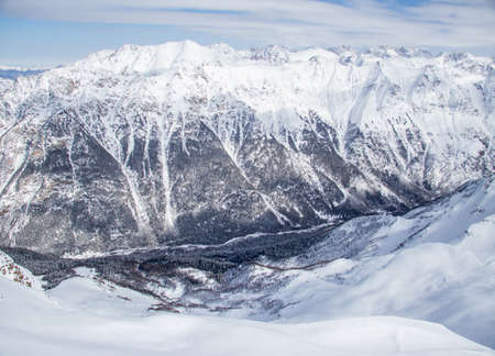 snowy valley between the mountains of the Caucasus