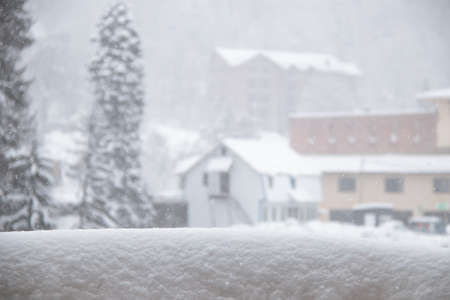 View from cableway station in the strong snowfall in the mountainsの写真素材