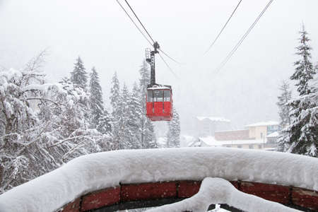 Cableway in the strong snowfall in the mountains of the Caucasusの写真素材