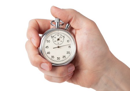 Close up of hand holding stopwatch