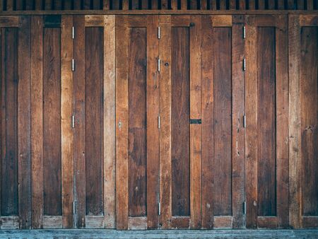 A classic brown wooden doors for backgroundの写真素材