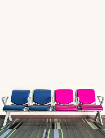 chairs in waiting room against a wallの写真素材