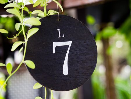 number seven plate of table in restaurant for wedding party with blur background