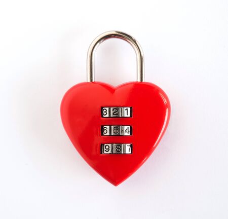 combination lock Red heart-shape combination lock isolated on white background