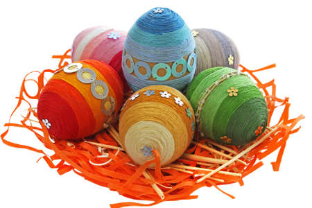 Isolated colorful Easter eggs in the nest