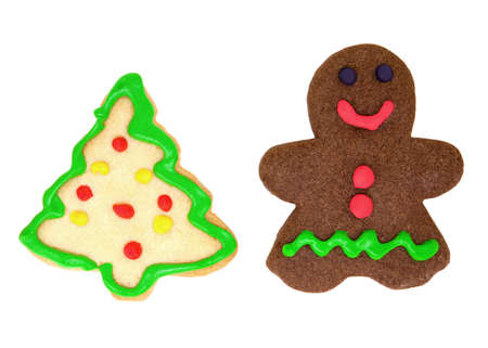 Isolated homemade cookies in the shape of Gingerbread Man and Christmas Tree の写真素材