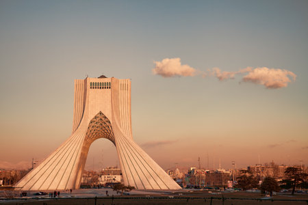 Azadi square the famous landmark of Tehran, at sunset.