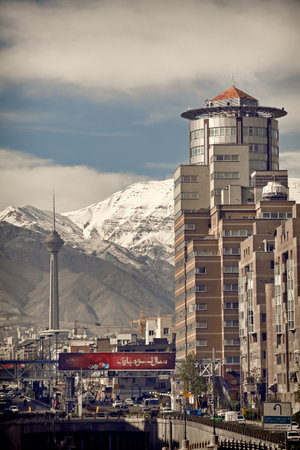 TEHRAN, IRAN - APRIL 1, 2014: Milad Tower and Navvab buildings in front of Alborz Mountains on a clear day. Milad Tower is the second most important landmark of Tehran.のeditorial素材