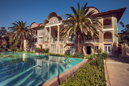 Persian garden of Eram in Shiraz with its beautiful pavilion reflected on the turquoise pool in front of it.のeditorial素材
