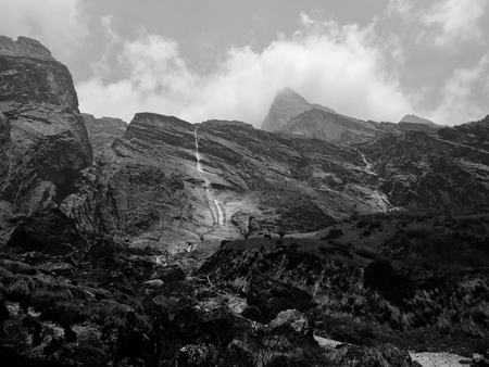 Dramatic view of mountain with small water fall in Annapurna mountains in Nepal