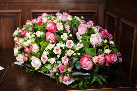 Floral decorations with different sorts of flowers, roses, tulips, and othersの写真素材