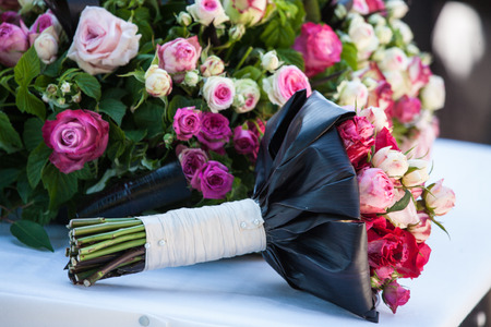 Floral decorations with different sorts of flowers, roses, tulips, and othersの写真素材