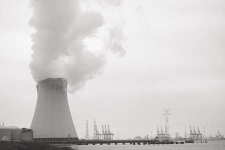 May 2016, Doel, Antwerp, Belgium, Cooling towers of the nucleair power plant in Doel next to the river Scheldtのeditorial素材