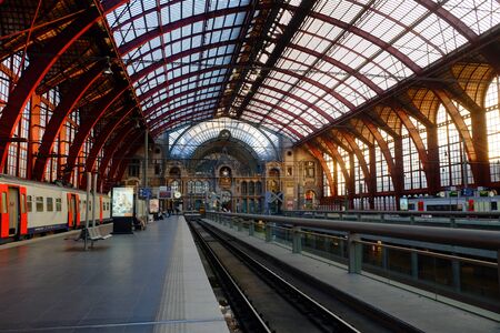 Antwerp, Belgium - May 2019: The train is waiting at the upper deck platform for passengers Inside the beautiful, historic and monumental Antwerp Train Stationのeditorial素材