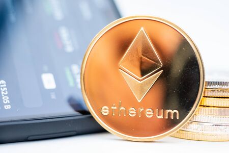Cryptocurrency stock market app open on a smartphone depicted with some of the current...