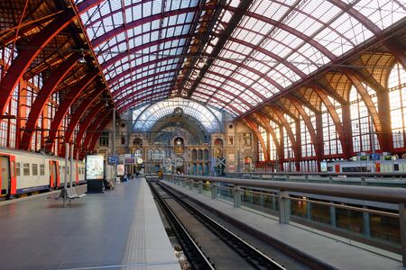 Antwerp, Belgium - May 2019: The train is waiting at the upper deck platform for passengers Inside the beautiful, historic and monumental Antwerp Train Stationのeditorial素材