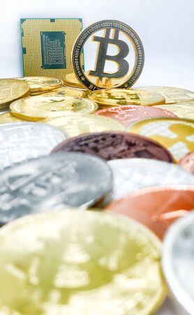 Antwerp, Belgium, February 2020, Many golden bitcoins and a computer CPU, Cryptocurrency and virtual...