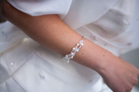 The morning of the bride. Preparing the bride for the upcoming wedding. Accessories of the bride. High quality photoの写真素材