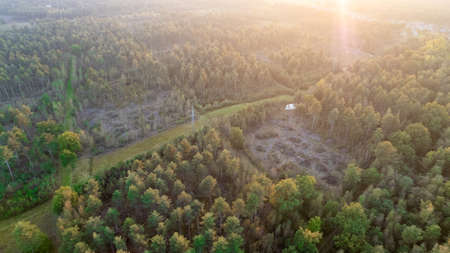Land or landscape of green field in aerial view. Include agriculture farm, house building, village....