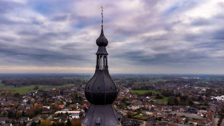 Belgium, Hoogstraten, 11 november 2021, Aerial drone photo of the late Gothic Saint-Katharina church, the third highest Belgium church, one of the worlds tallest brick buildings. High quality photoのeditorial素材