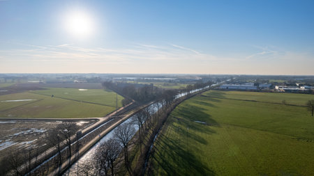 canal Dessel Schoten aerial photo in Rijkevorsel, kempen, Belgium, showing the waterway in the natural green agricultural landscape. High quality photo. High quality photoの写真素材
