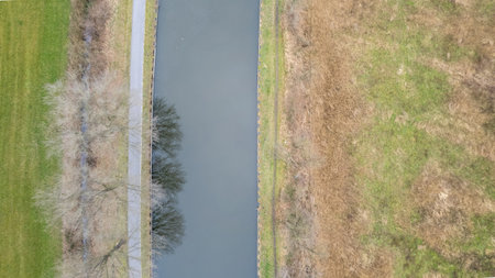 canal Dessel Schoten aerial photo in Rijkevorsel, kempen, Belgium, showing the waterway in the natural green agricultural landscape. High quality photo. High quality photoの写真素材