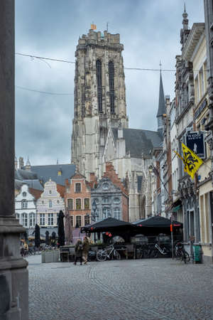 MECHELEN, Malin, Antwerp, BELGIUM, March 2, 2022, Gothic architecture, Bell Tower of the Saint Rumbolds Cathedral from the Grote Markt in Mechelen, Belgium. High quality photoのeditorial素材