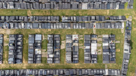 Aerial drone view of cemetery and graves in the city of Mechelen, Belgium. Graveyard, view from above. . High quality photoのeditorial素材