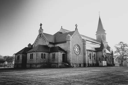 Merksplas, Belgium, April 27th, 2022, The Chapel in Merksplas Colony in the bright sunrise light . High quality photoのeditorial素材