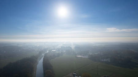 Rijkevorsel, Belgium, 14th of april, 2022, Little village of Sint Jozef, on the canal Dessel Schoten aerial photo in Rijkevorsel, kempen, Belgium, showing the waterway in the natural green agricultural landscape. High quality photo. High quality photoの写真素材