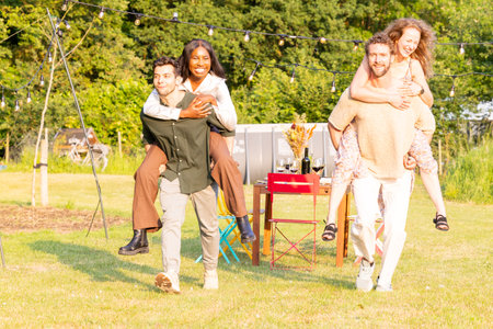 An engaging image capturing a moment of joy and competition as two multicultural couples participate...