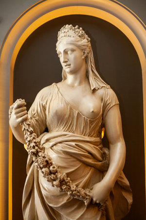 This stunning marble statue beautifully depicts a noble woman who is gracefully adorned with a laurel wreathの写真素材