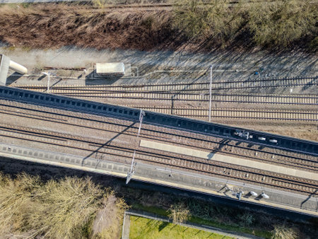 This is an aerial perspective showcasing railway tracks beautifully integrated within their natural...