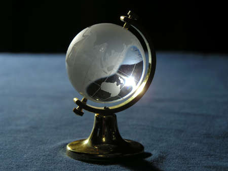 Souvenir. The glass globe on a metal support.