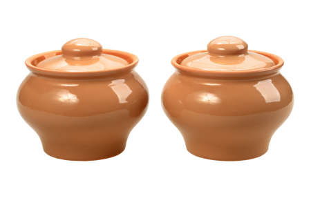 Two ceramic pots. New condition. Isolated on white background. Close-up. 