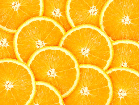 Abstract background with citrus-fruit of orange slices. Close-up. Studio photography.