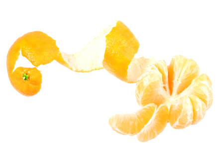 One peeled fruit of orange tangerine. Isolated on white background. Close-up.の写真素材