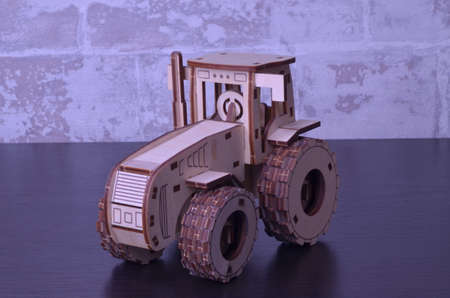 toy tractor on black and white backgroundの写真素材