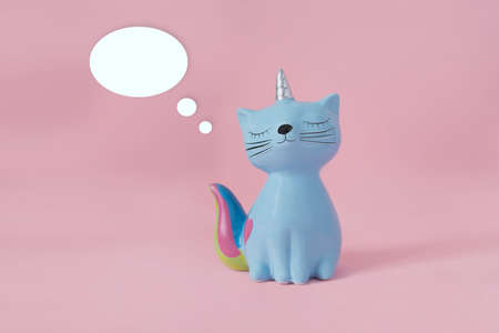 ceramic souvenir toy moneybox kitten Korn blue with colorful rainbow tail with closed eyes and...